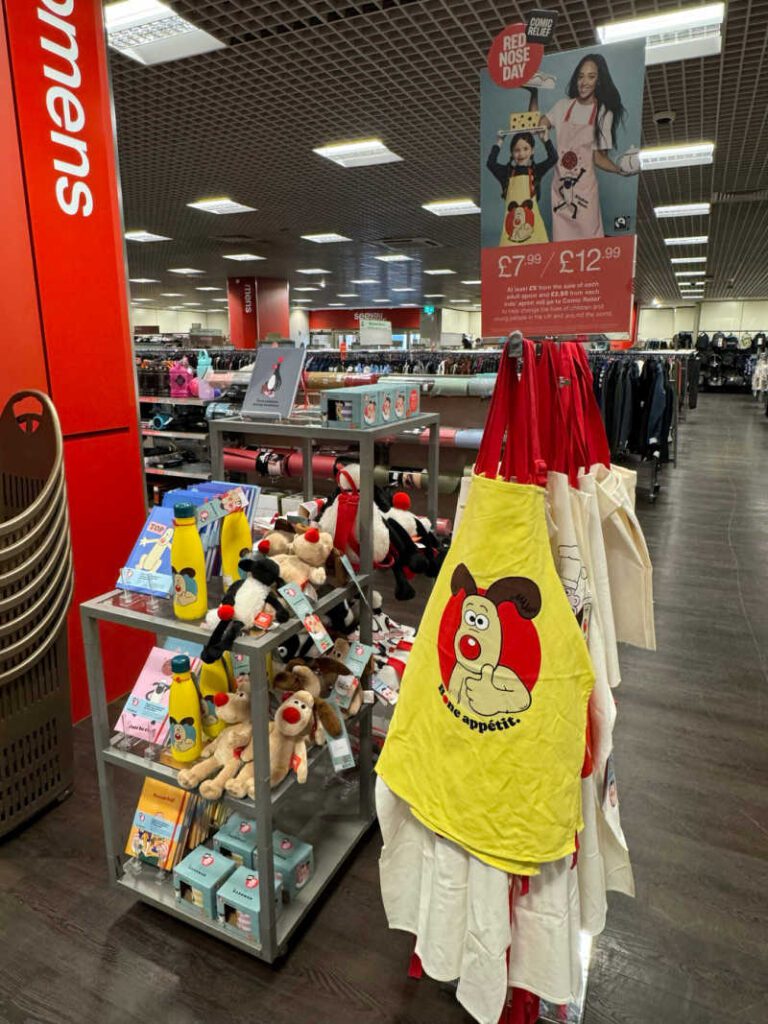 Apron with Wallace and Gromit on it and other gifts for Red Nose Day at TK Maxx