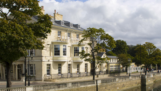 Bedford Swan Hotel exterior pale stone, river and trees