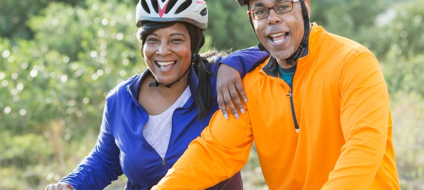 Cycle King smiling couple on bikes