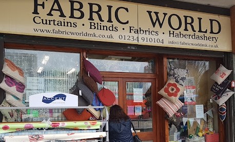 FabricWorld shopfront with fabrics and cushions out the front