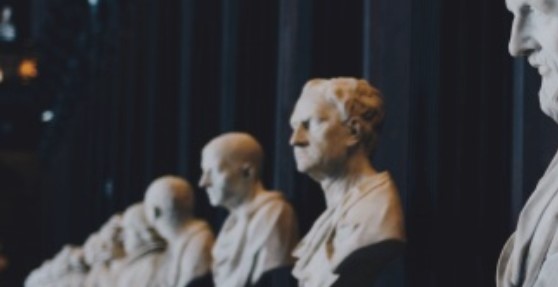 Longstaff image of marble heads in a row
