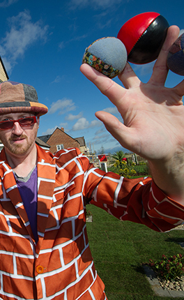 Stevie Vegas Circus Skills image of Stevie with juggling balls.